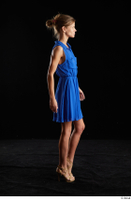  Sarah Kay  1 blue dress brown high heels casual dressed side view walking whole body 0003.jpg